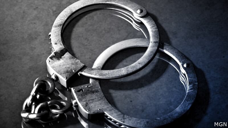 FILE - A man is in custody after police say he and another man raped a college student in...