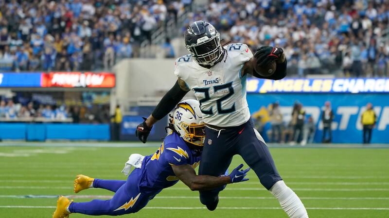FILE - Tennessee Titans running back Derrick Henry (22) runs against Los Angeles Chargers...