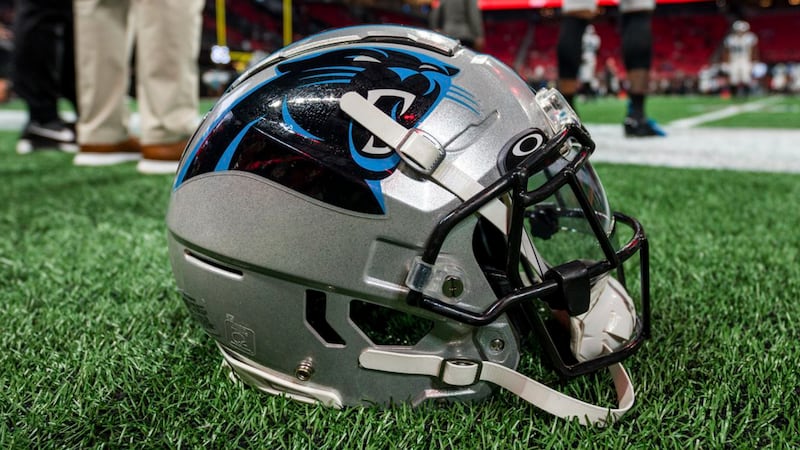 A Carolina Panthers helmet sits on the sideline before an NFL football game against the...