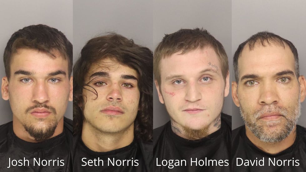 Four men charged in homeless camps attacks.