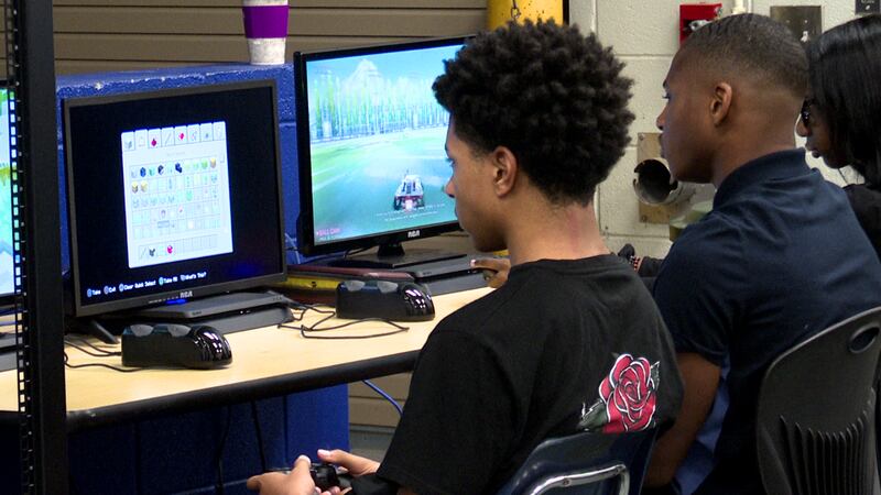 Kids are playing games in the classroom.