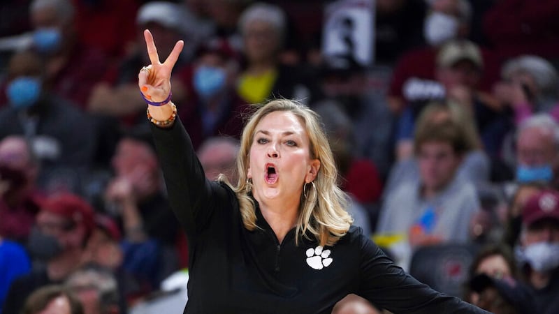 Clemson coach Amanda Butler signals to players during the first half of the team's NCAA...