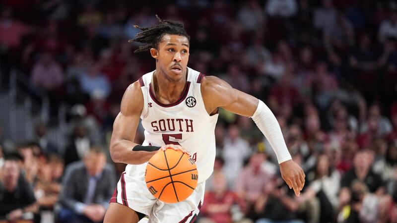 FILE - South Carolina guard Meechie Johnson dribbles the ball during the second half of the...