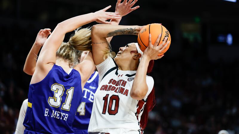 South Carolina center Kamilla Cardoso (10) looks to shoot over South Dakota State forward...