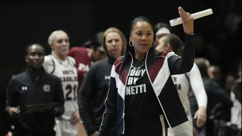 South Carolina head coach Dawn Staley signals from the bench during second half of an NCAA...