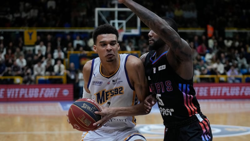 Boulogne-Levallois' Victor Wembanyama drives to the basket during the Elite basketball match...