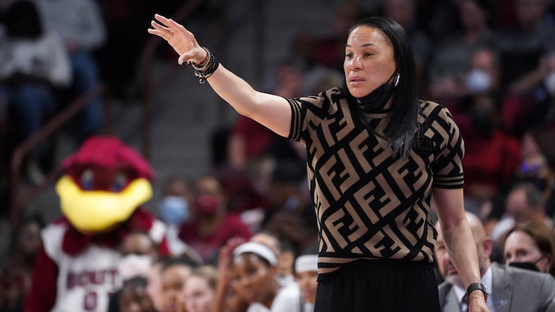 South Carolina head coach Dawn Staley communicates with players during the first half of a...