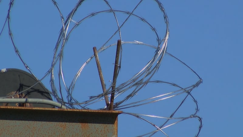 One of the group climbed to the roof using clothes and other items to get over the razor wire....