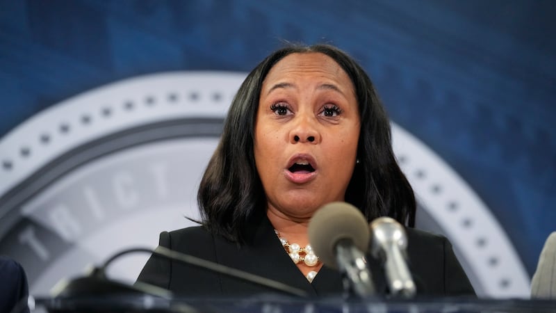 FILE - Fulton County District Attorney Fani Willis speaks in the Fulton County Government...