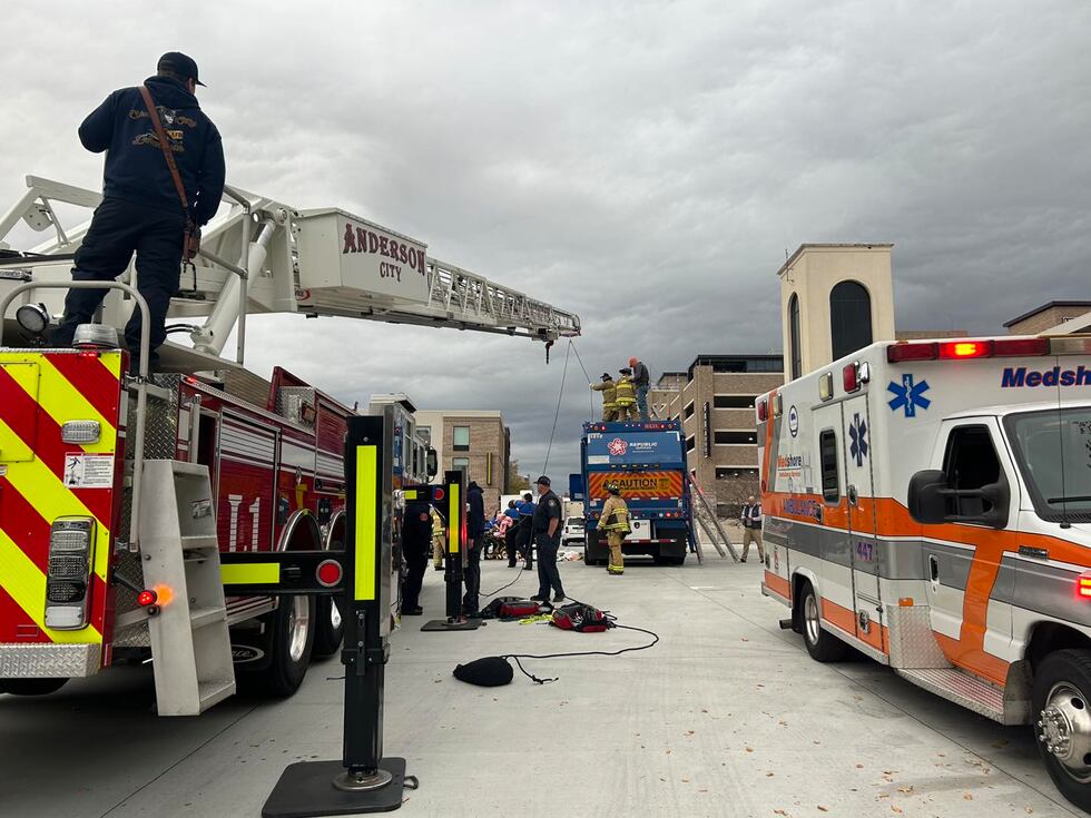 Person rescued from solid waste truck in Anderson.